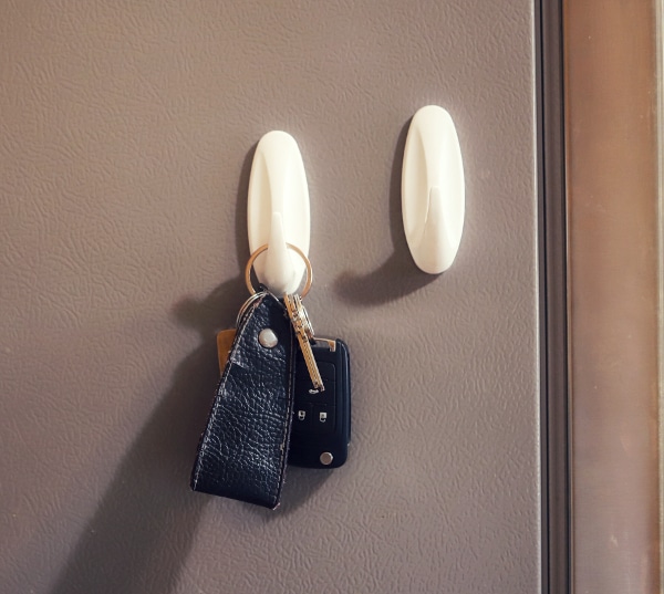 Keys hanging on hook by door