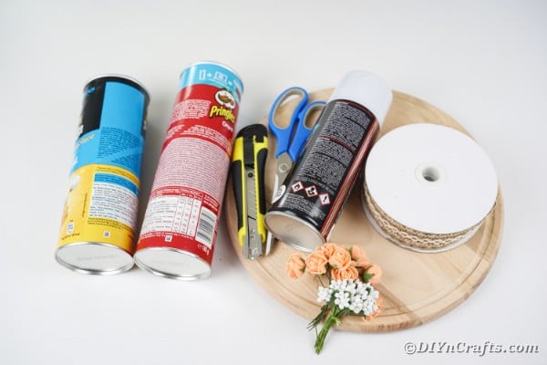 Supplies for storage cans on table