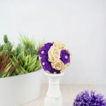 Tissue paper rose ball on candlestick