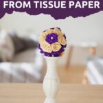 Tissue paper rose ball on candlestick