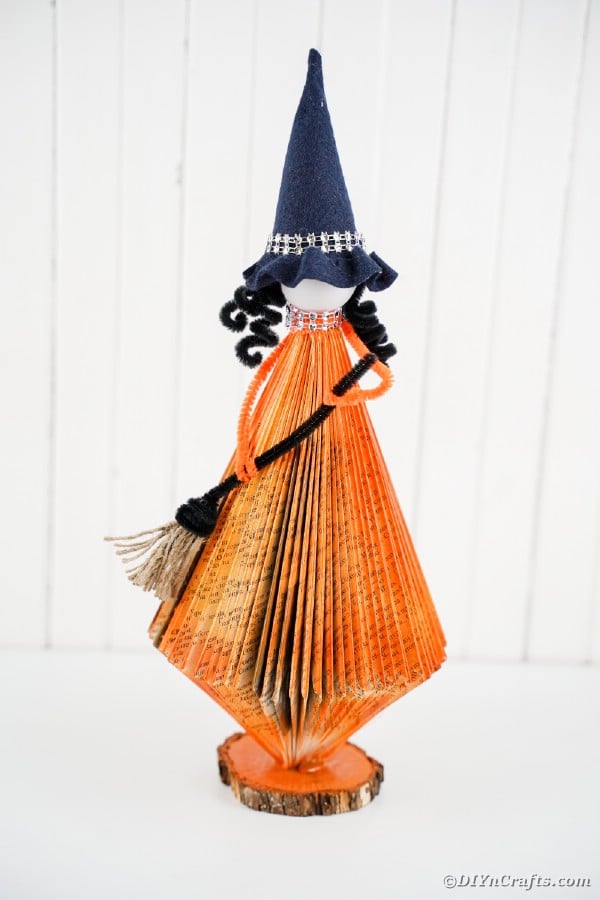 Orange paper book witch with white background
