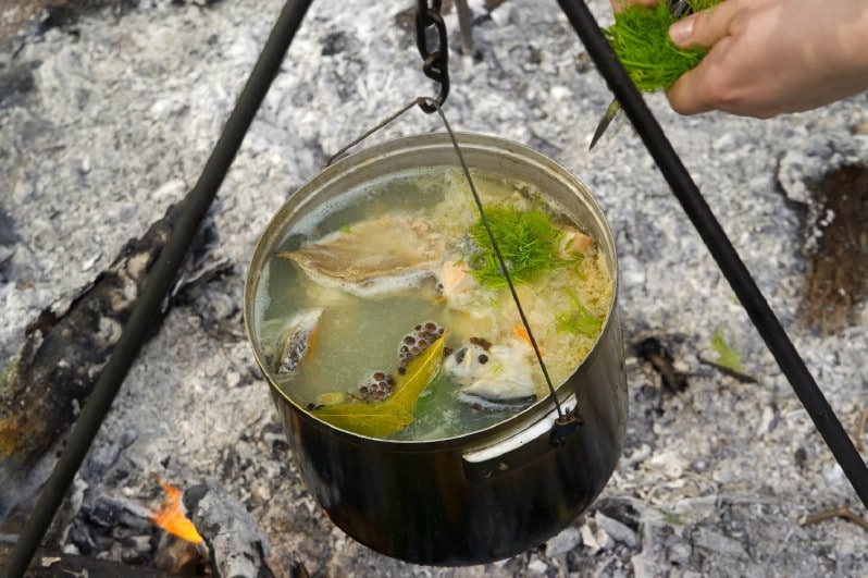 Making poached fish outside