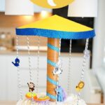 Diaper cake carousel on wooden table
