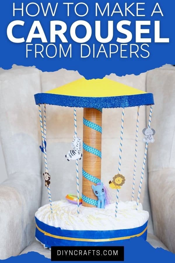 Diaper cake on grey chair