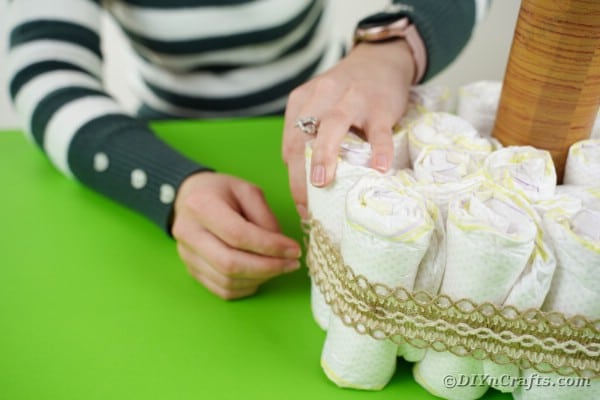 Wrapping diapers with burlap lace