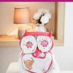 Owl diaper cake on table