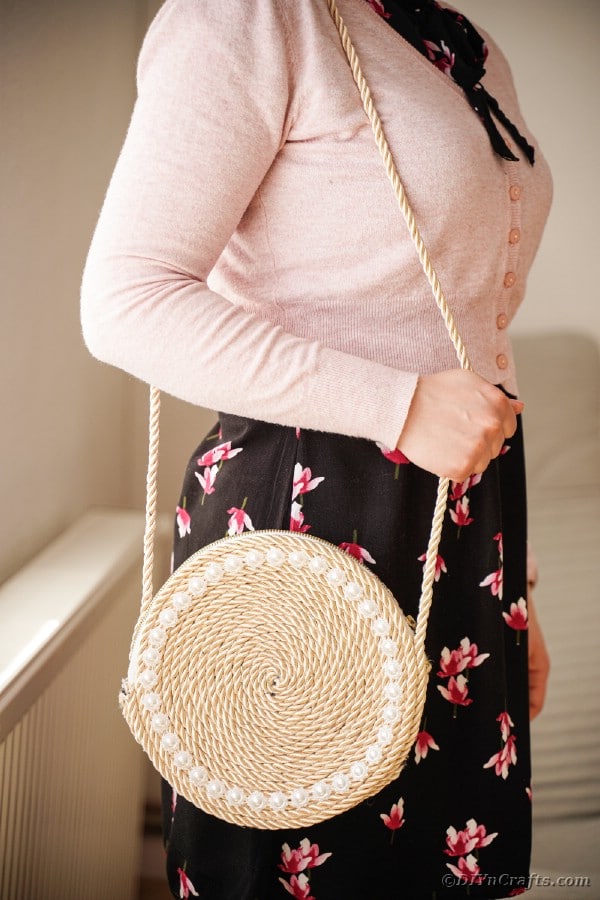 Woman wearing rope purse