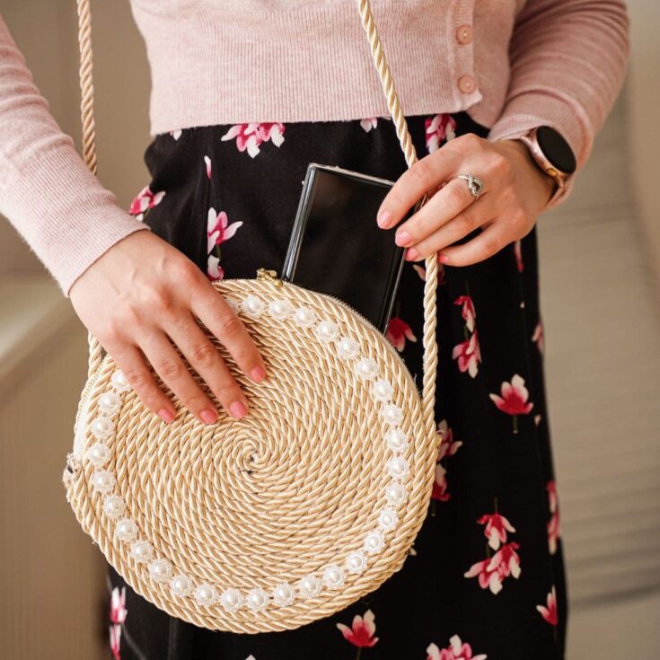 Woman holding rope purse