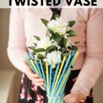 Woman holding twisted vase