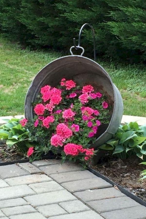 galvanized bucket with pink flowers