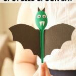 Woman holding spoon batWoman holdign spoon bat