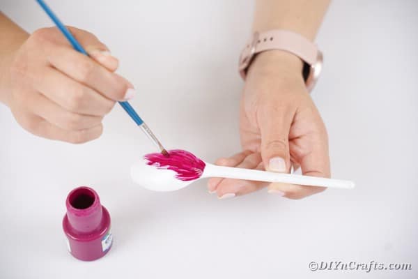 Painting a spoon pink