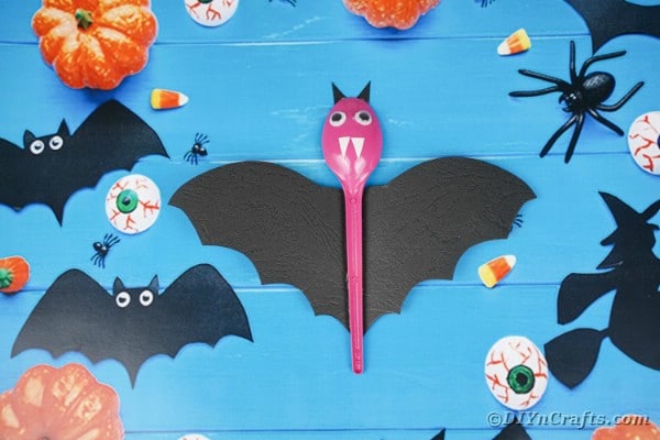 Spoon bats on blue background