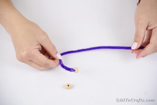 Adding bead to pipe cleaner