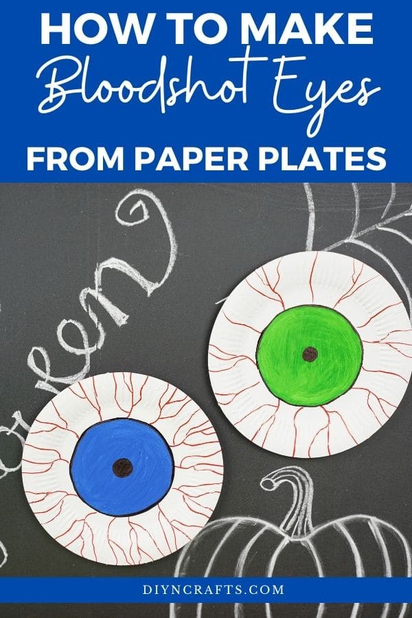 Paper plate bloodshot eyeballs on Halloween chalkboard
