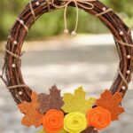 Fall wreath with flowers hanging in tree