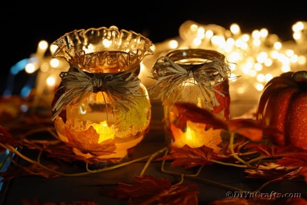 Fall leaf lanterns with candles lit