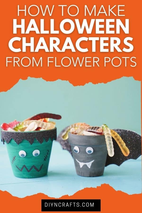 Flower pot Halloween characters on blue table