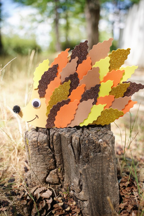 Paper leaf hedgehog on stump