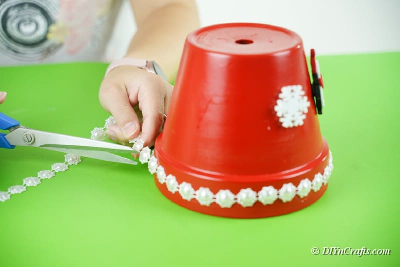 snowflakes being applied to pot 