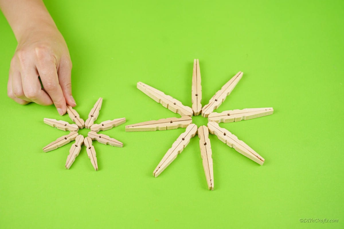 two sets of clothespin star designs