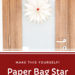 Paper bag star hanging on a door