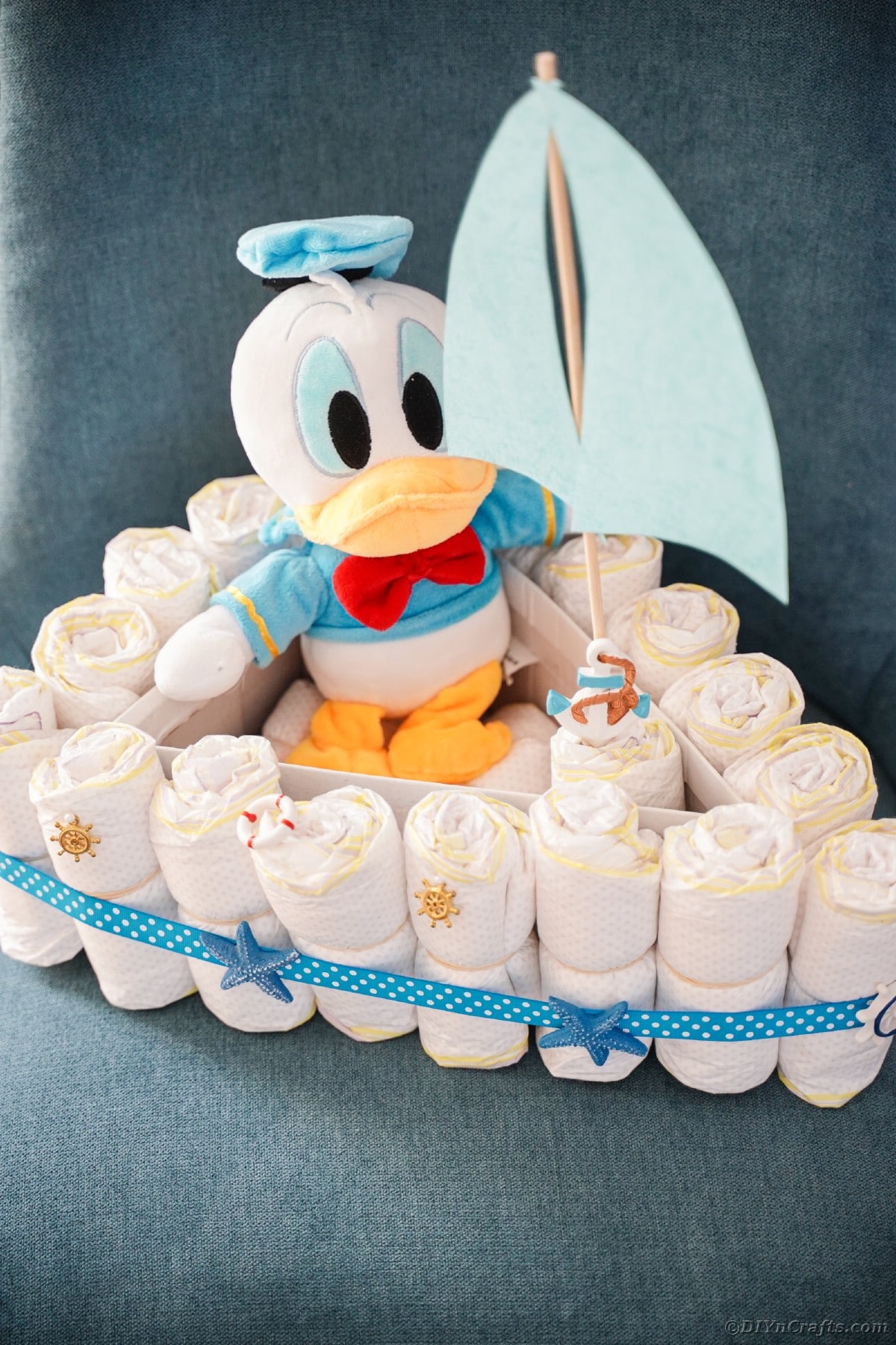 Boat diaper cake on chair