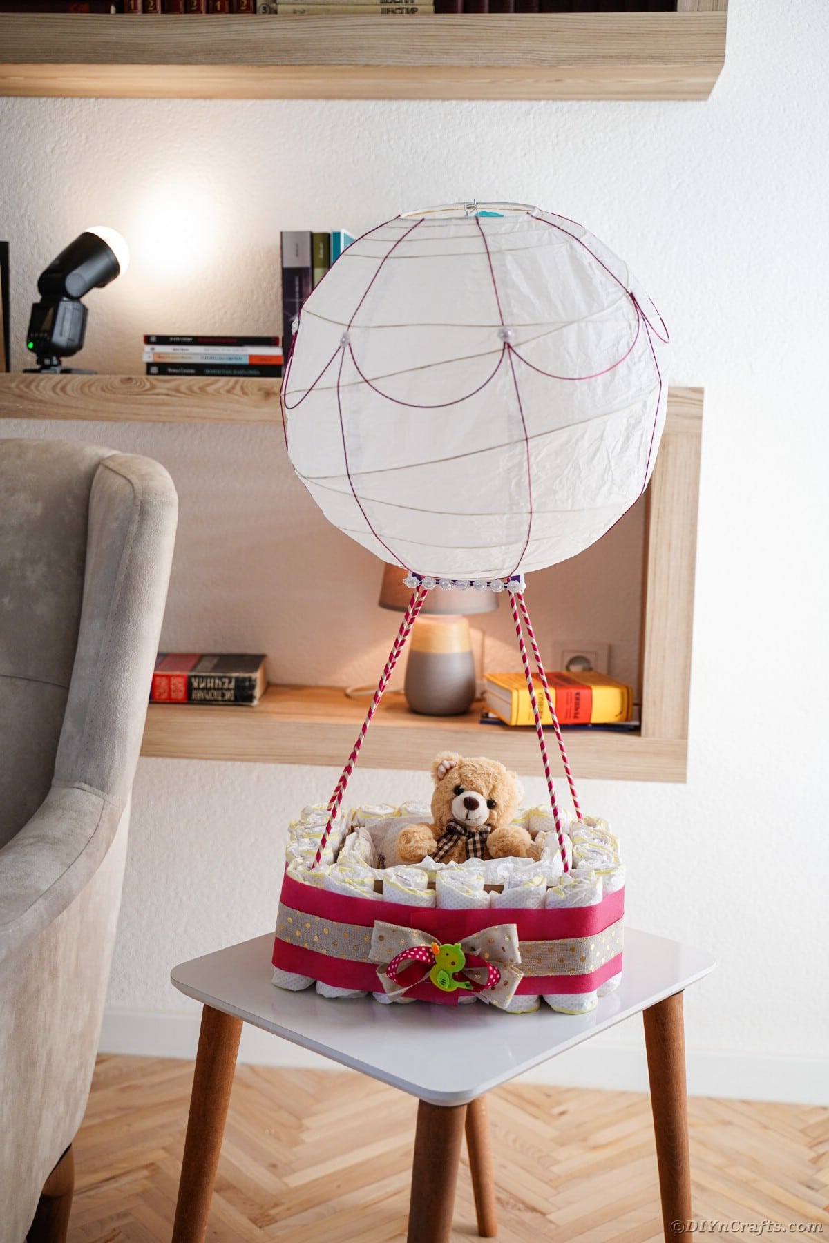 Hot air balloon diaper cake on table