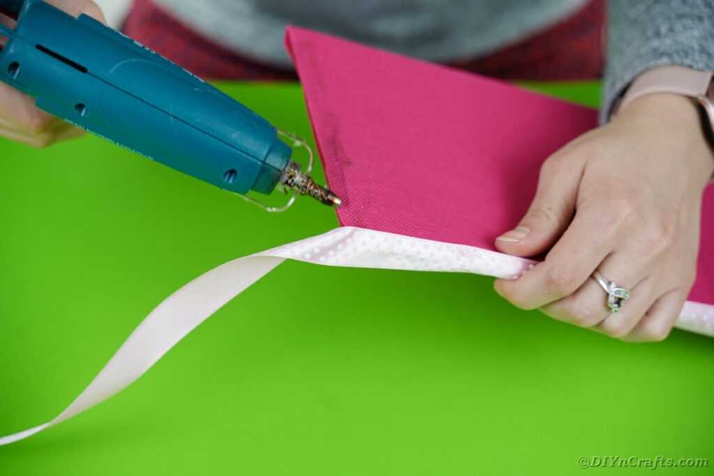 Gluing ribbon on cardboard