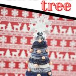 Mini Christmas tree in front of red holiday paper