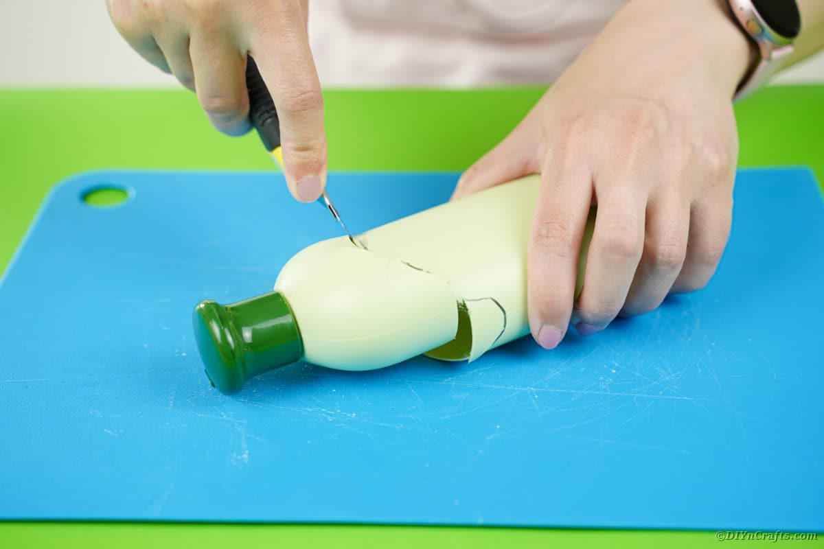 Cutting a shampoo bottle