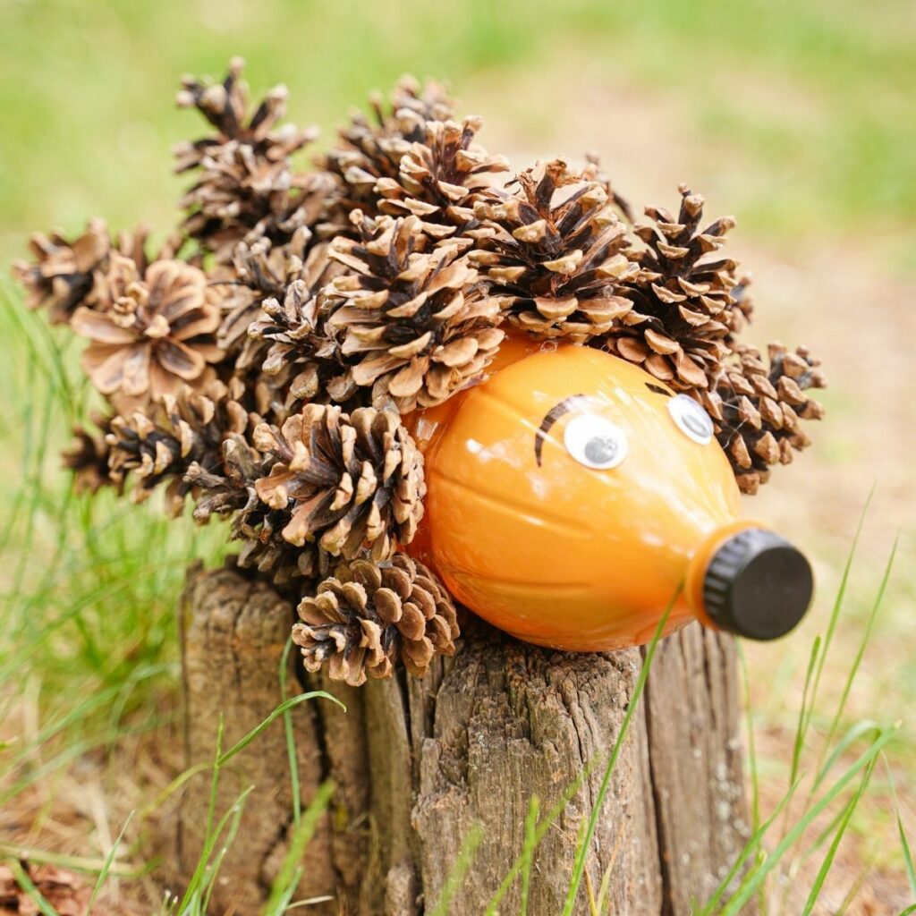 Pinecone hedgehog on a stump
