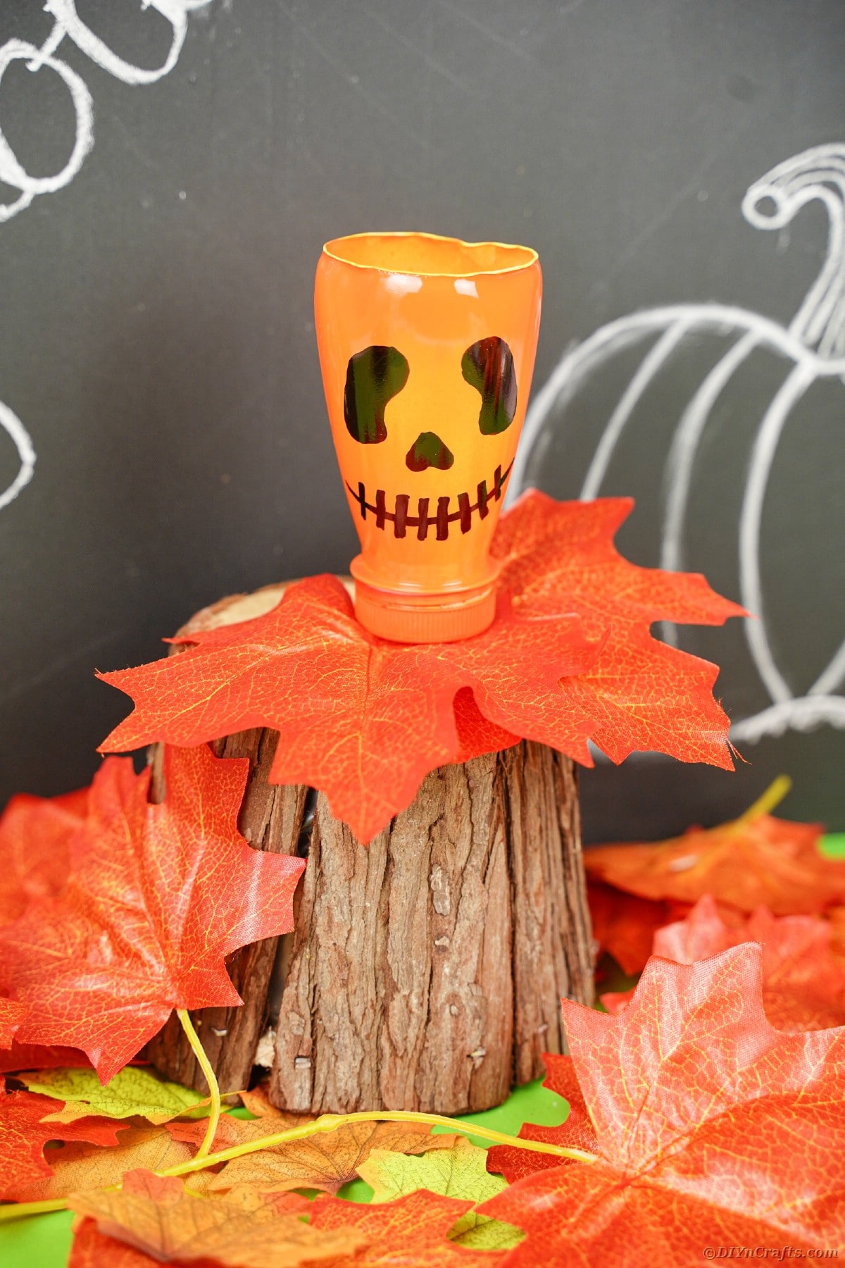 Pumpkin lantern by chalkboard