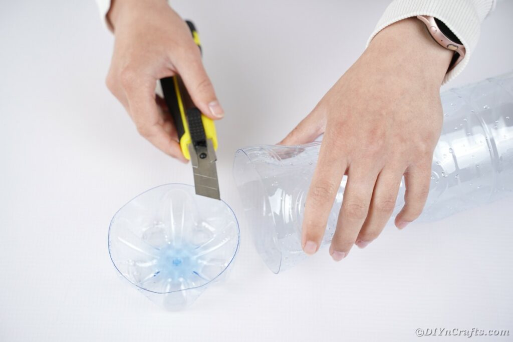 Cutting bottom of bottle