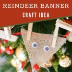 Reindeer themed decorative banner on a Christmas tree