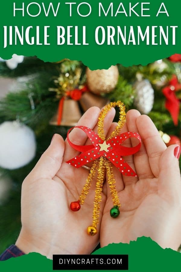 Woman holding pipe cleaner ornament