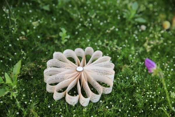 Paper flower on grass