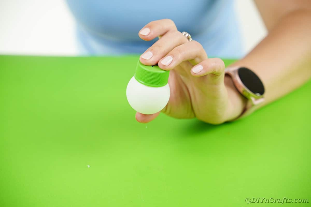 Attaching top to ping pong ball