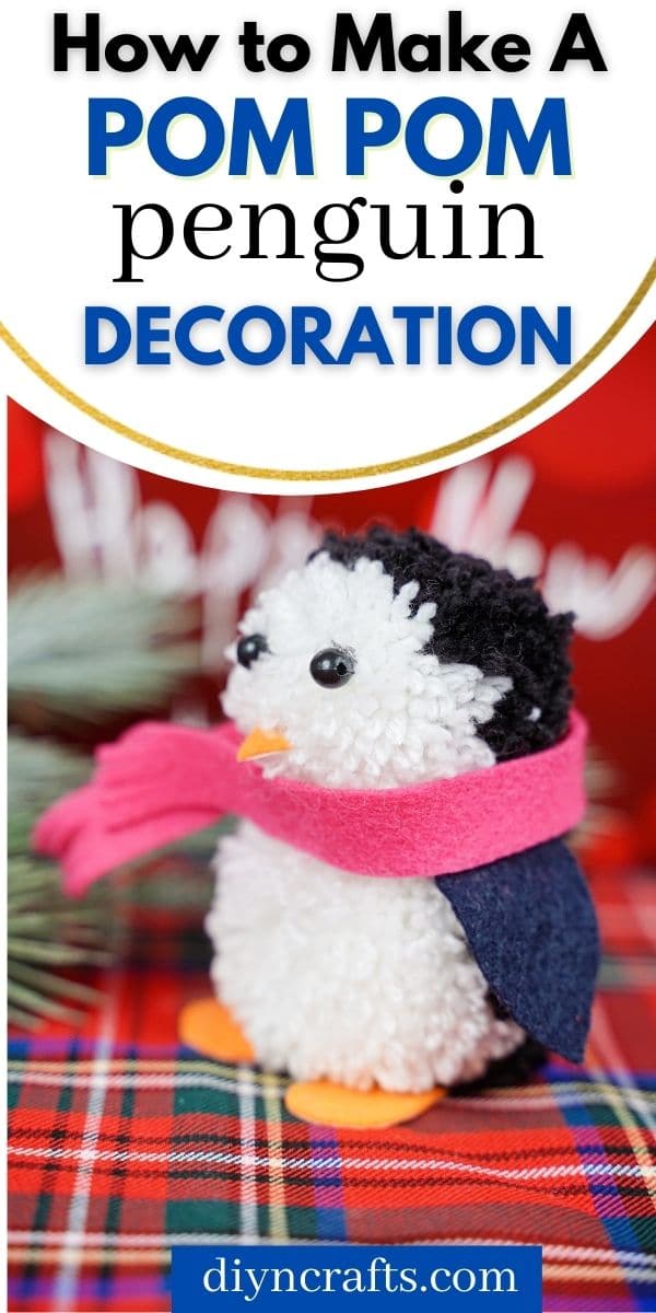 Pom pom penguin on flannel