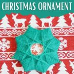 Yarn star on Christmas paper