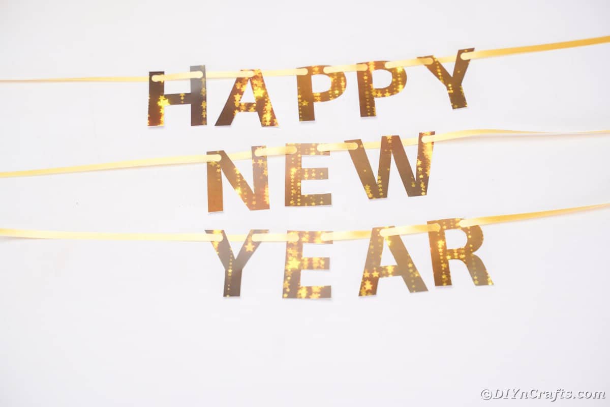 Happy new year banner on white surface