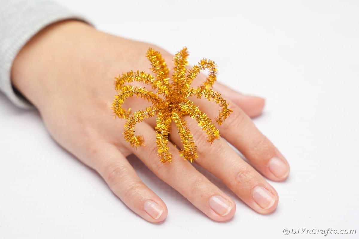 Pipe cleaner ring on woman's hand