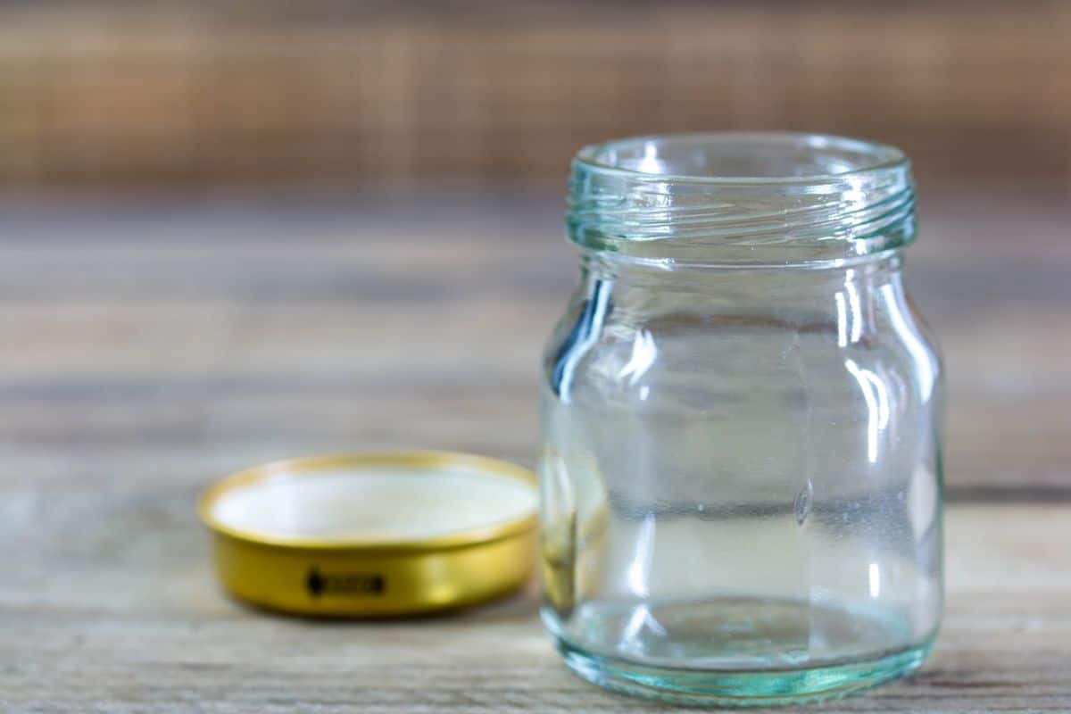 opened glass jar in a table 