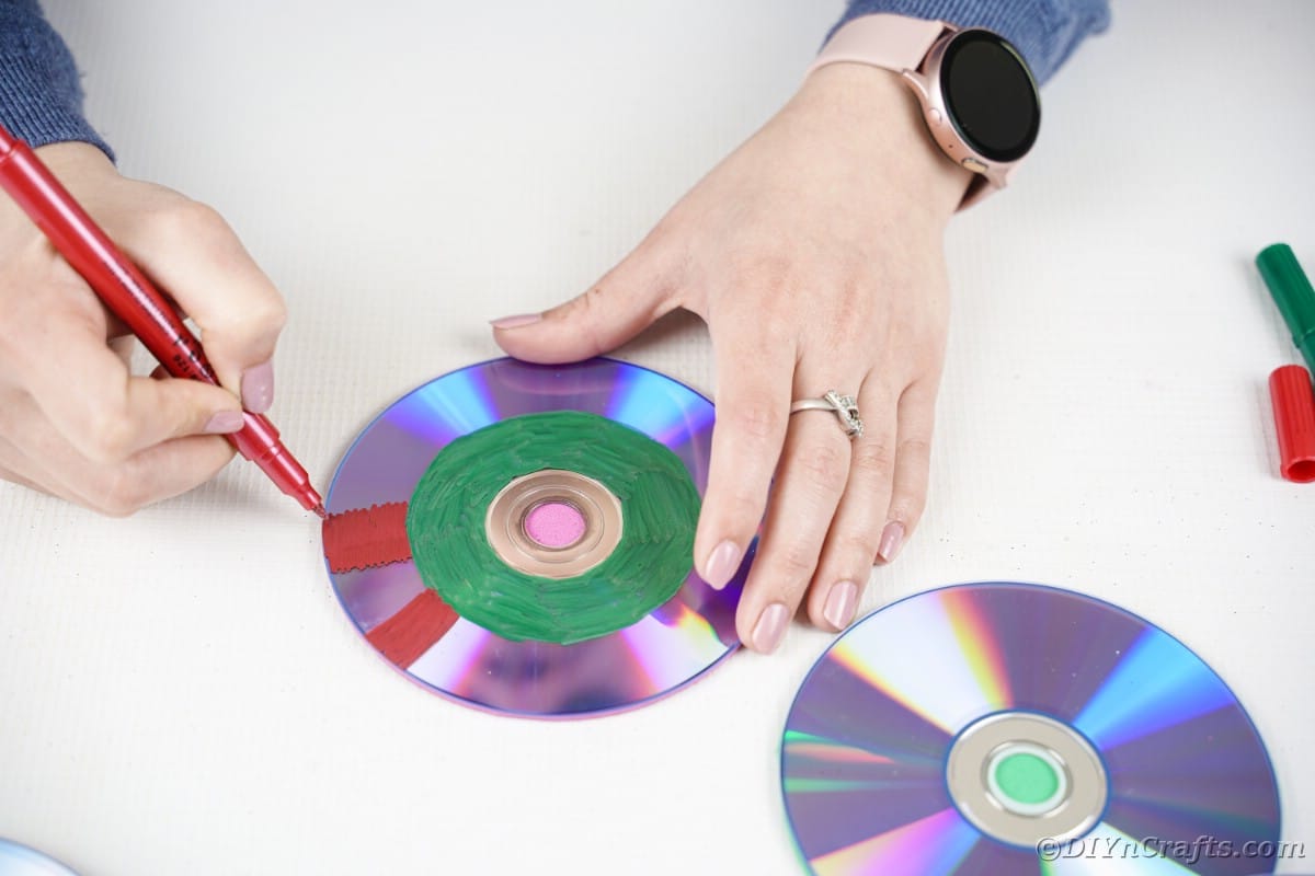 Painting CD with red stripes