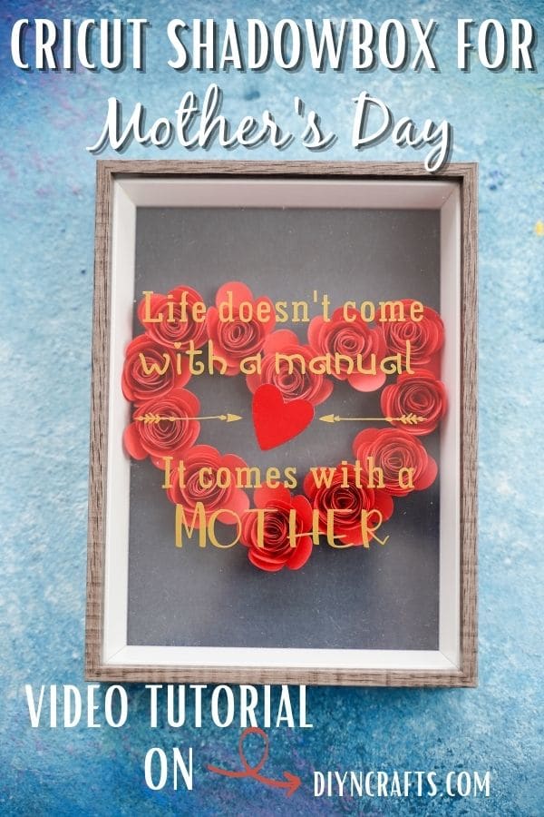 Black shadowbox with red flower heart and gold message