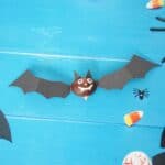 Halloween bat decoration on blue table