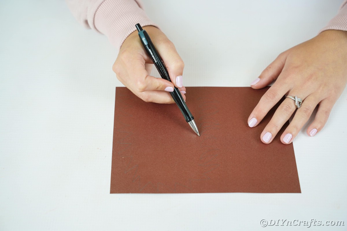 Handzeichnung auf braunem Papier