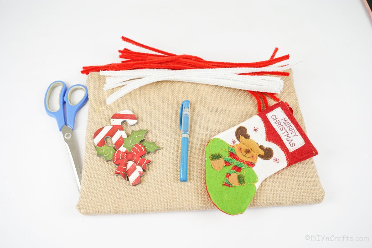 burlap pipe cleaners and a mini stocking on white table