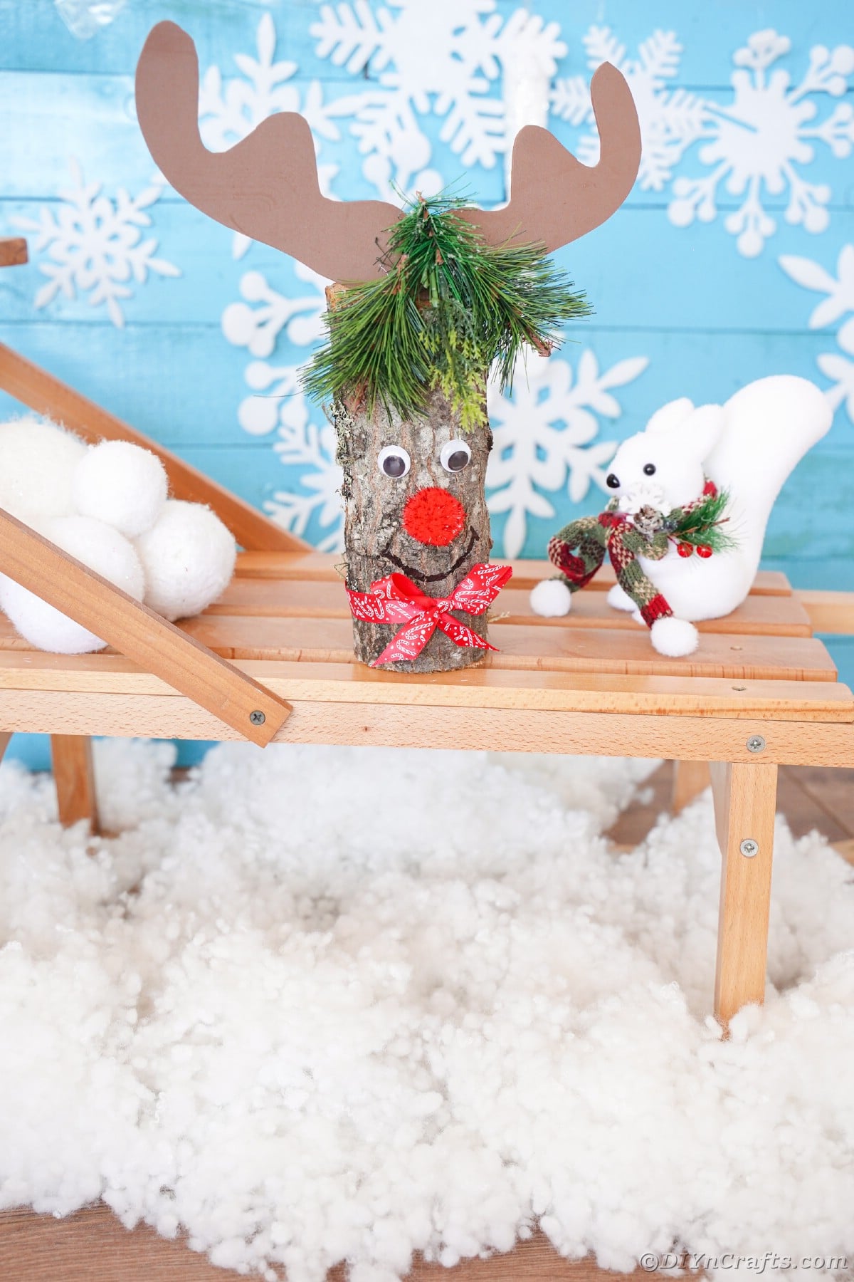 log reindeer on wooden tray