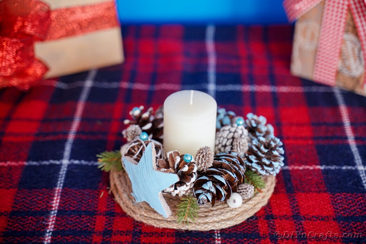 plaid table with rustic candle holder